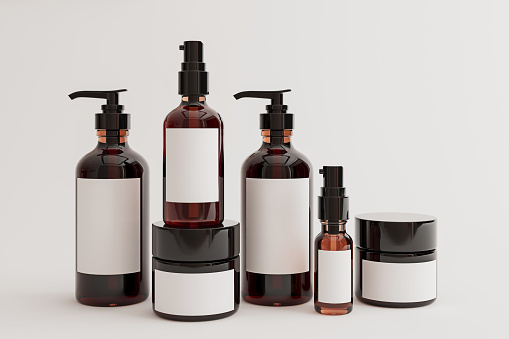 Maqueta de productos de belleza para el cuidado de la piel y el cabello, botella de loción, aceite, crema, aislado en blanco, presentación 3d, ilustración 3d